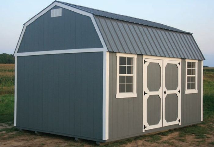 A gray lofted gambrel barn