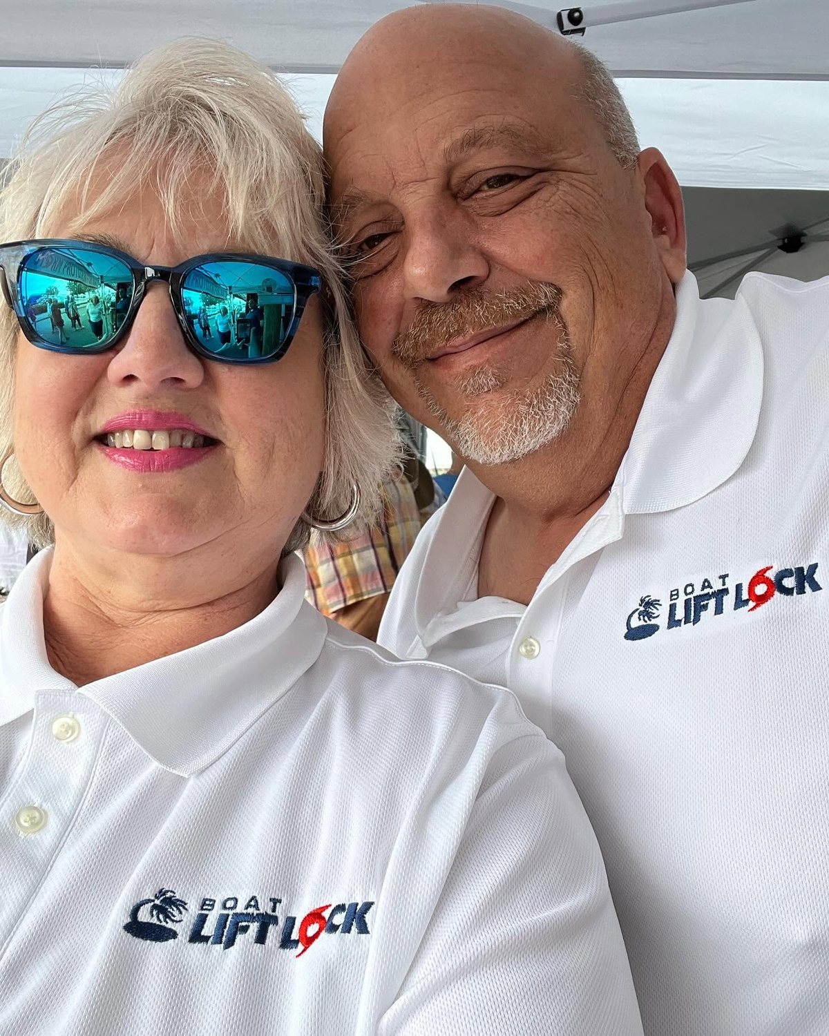 Keith and his partner of Boat Lift Lock at a boat show