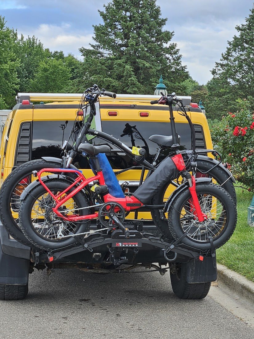 Two e-bikes loaded on a hitch rack