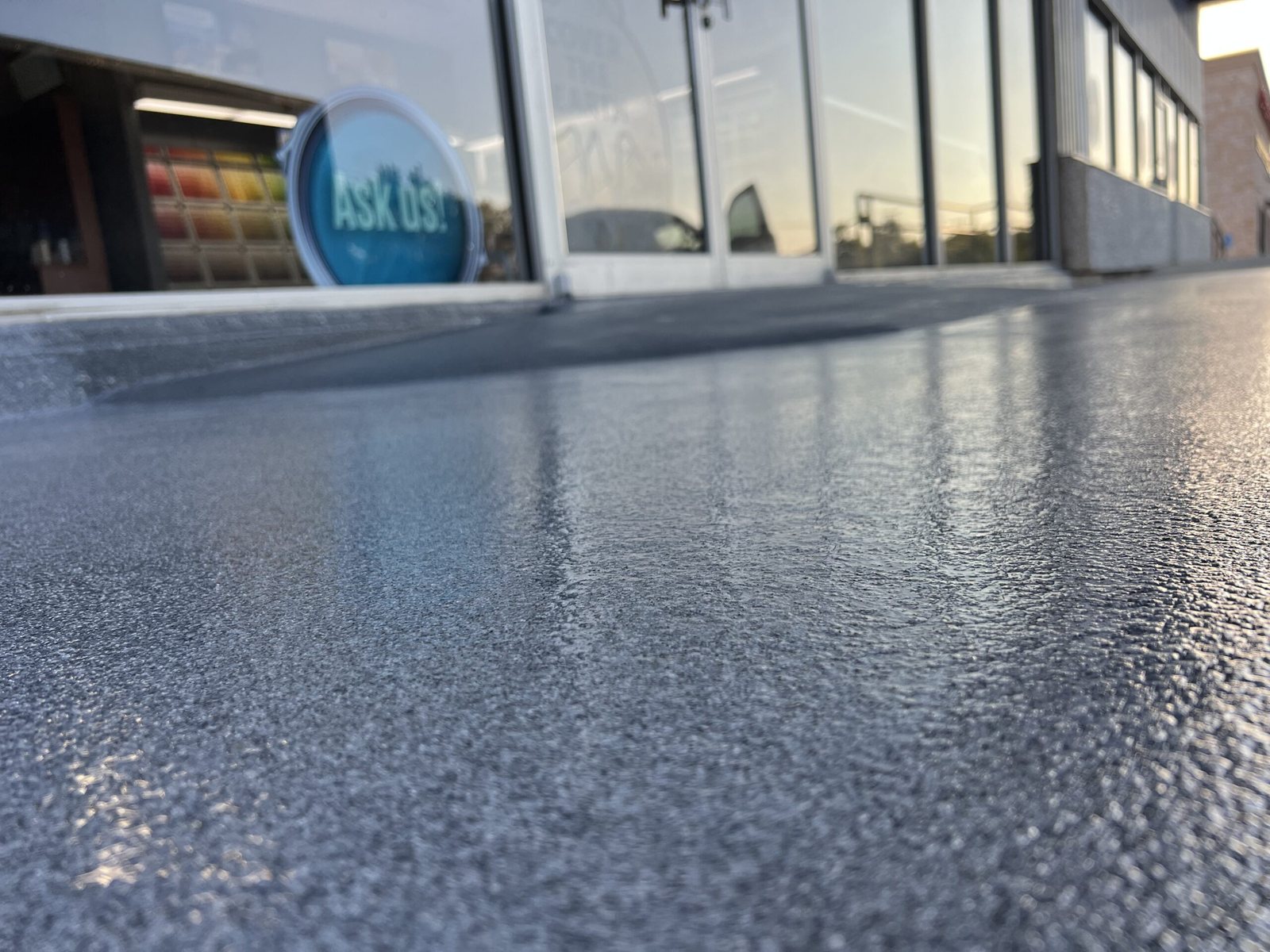 A finished floor outside a storefront
