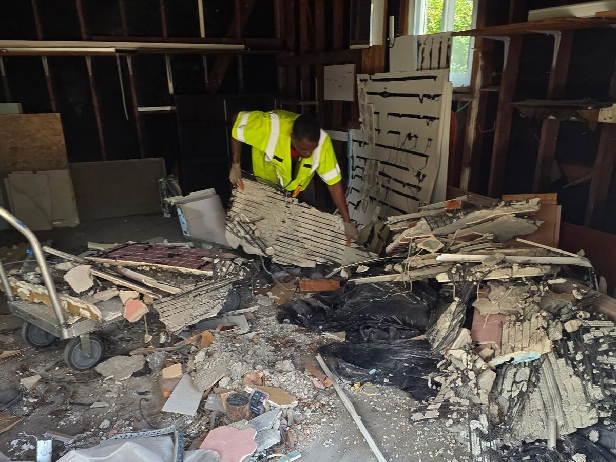 Garage debris cleanout before cleaning