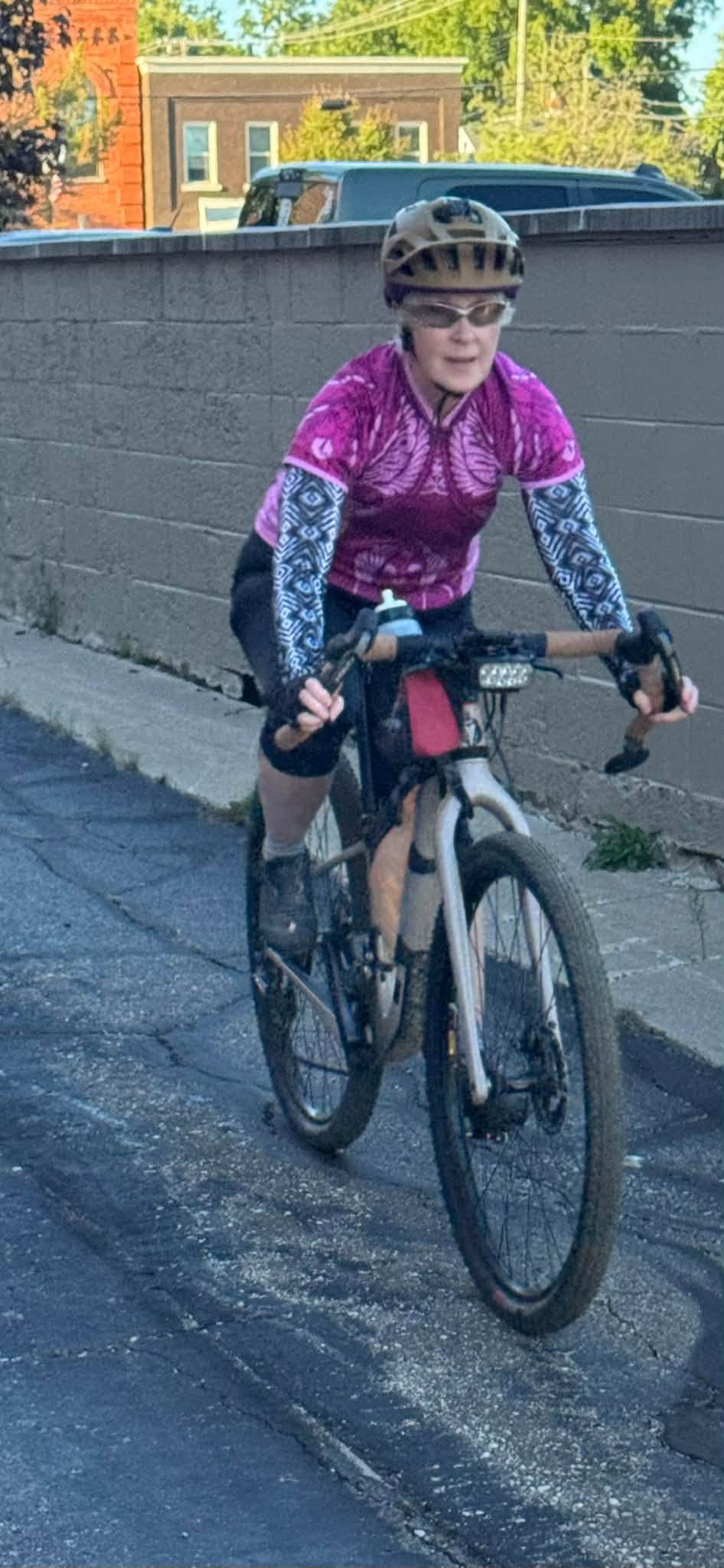 A rider on the group ride, smiling