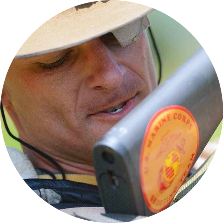 Sean Pickel behind a spotting scope at the national matches