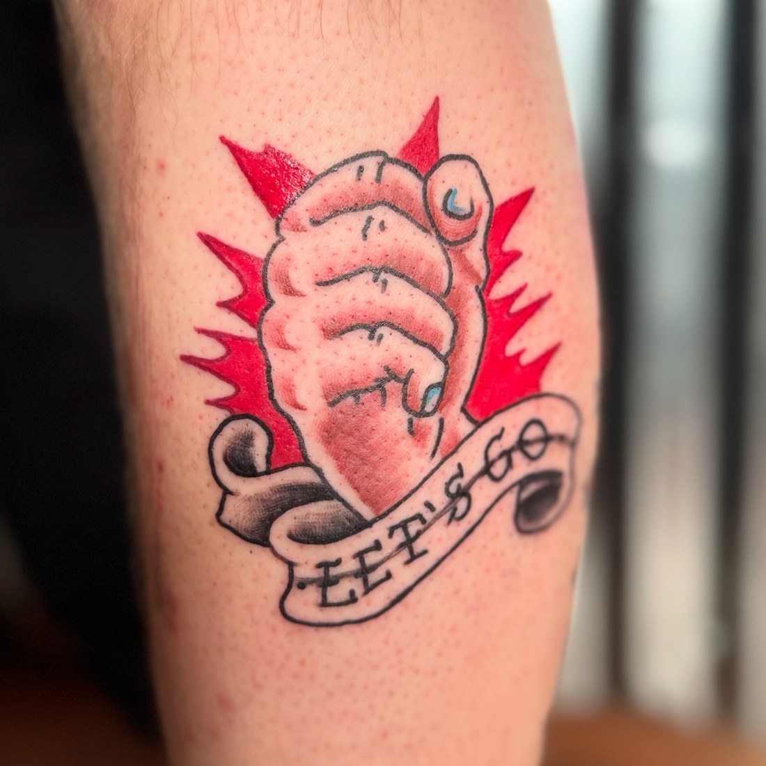 Traditional heart in hand with banner lettering
