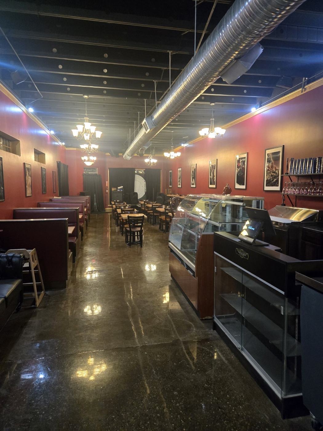 The finished Soulback dining room under chandeliers