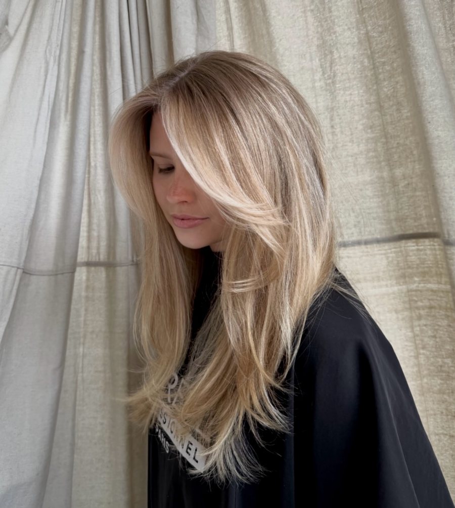 Bright blonde with long curtain layers