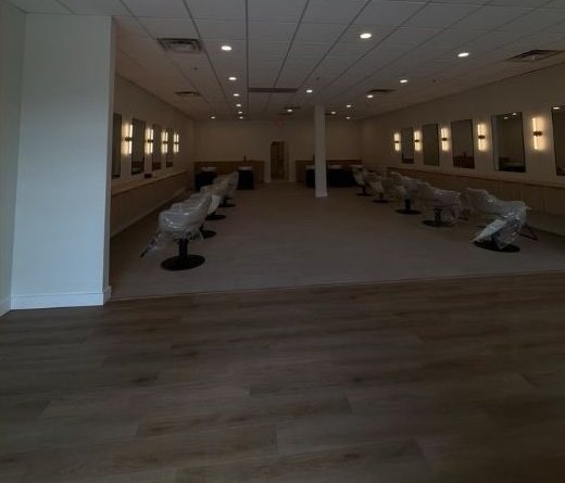 The salon floor with stations and mirrors