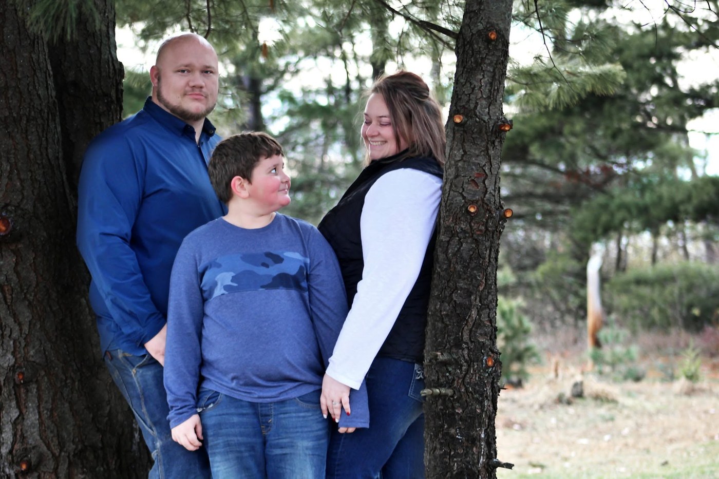 Crystal and Howard Farmer with their son