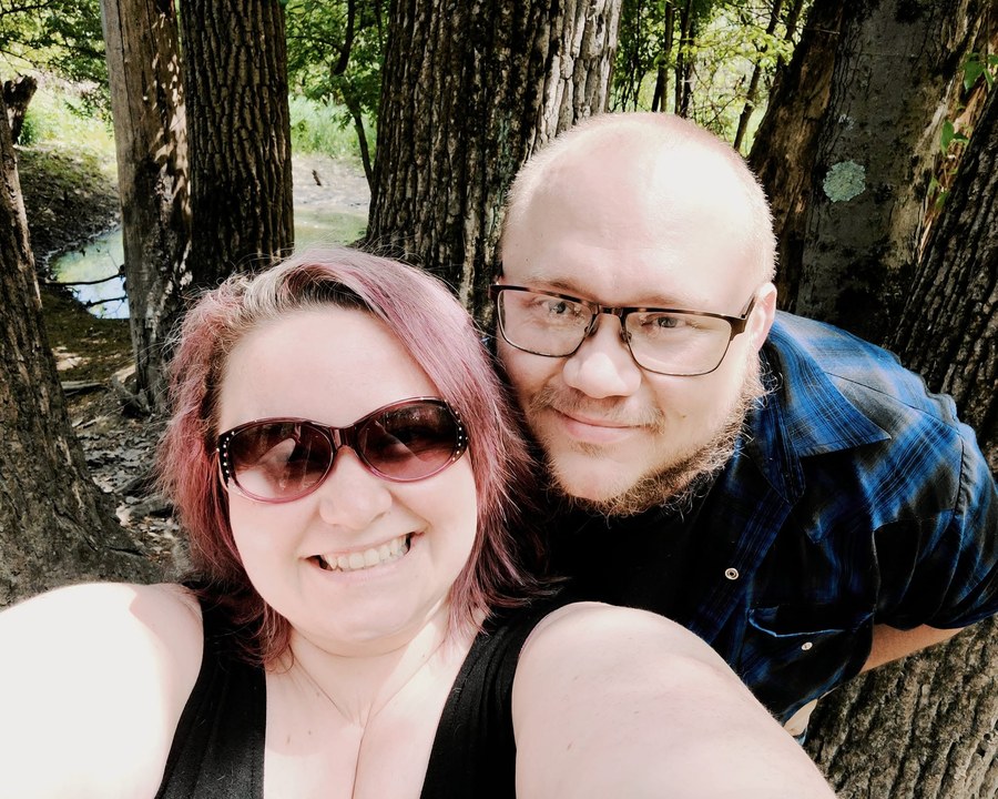 Crystal and Howard on a walk in the woods